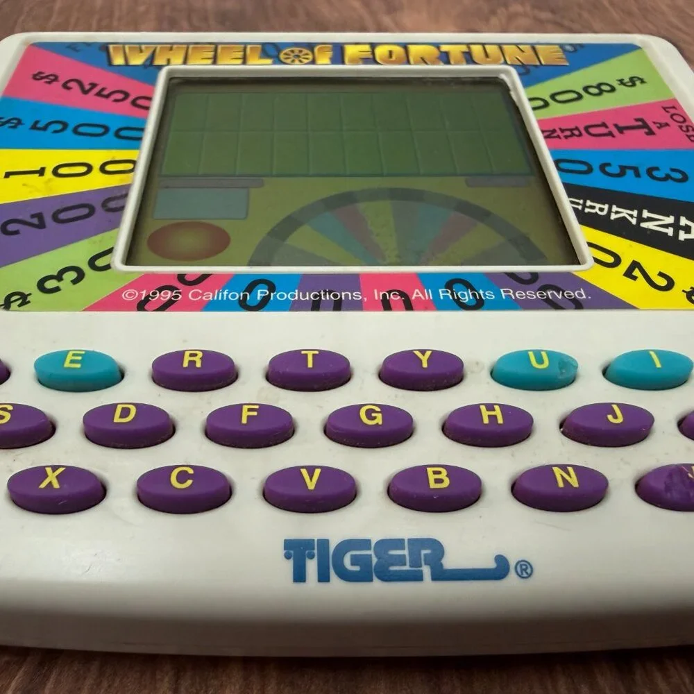 Vintage Wheel of Fortune Tiger Electronics Handheld Game 1995
